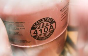 Pink refrigerant container reading 401A